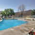 Motel 6 Lakewood, Co - Denver outdoor pool area with lounge chairs in Lakewood