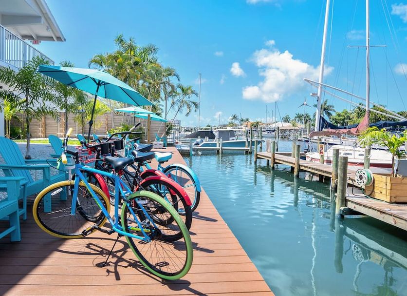 Latitude 26 Waterfront Boutique Resort - Fort Myers Beach dock with bikes and marina views