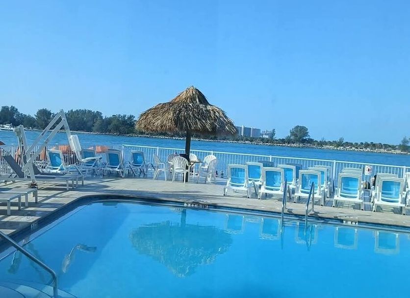 Gulfview Hotel - On the Beach pool with lounge chairs and beach view in Clearwater Beach