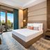 Çelik Palace Hotel Convention Center & Thermal Spa room in Bursa with balcony and seating area