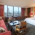 The Westin Xi'an hotel room in Xi'an with city view, king bed, seating area and large windows