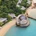 An Lam Retreats Ninh Van Bay in Thon Dam Van, beachfront round villa with pier and turquoise bay