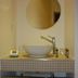 Hôtel En Ville in Aix-en-Provence bathroom vanity with round mirror and vessel sink
