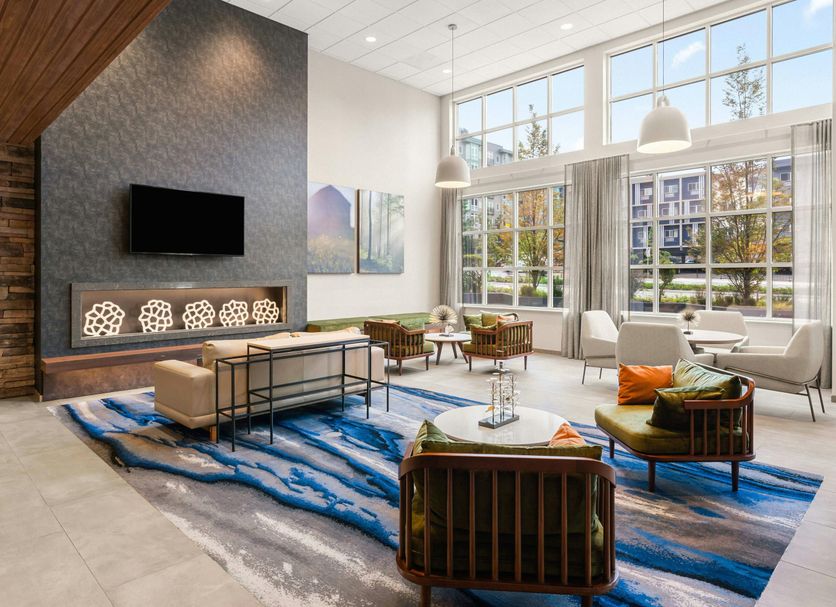 Fairfield Inn & Suites by Marriott Seattle Downtown/Seattle Center lobby with tall windows and modern seating