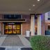 Holiday Inn Express & Suites Bowling Green By IHG entrance with covered driveway and columns