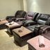 Le Charme Suites Subic in Olongapo: row of leather recliner seats with side tables in a lounge
