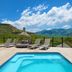 Kiara Lodge in Clarens with deck pool, loungers and mountain views