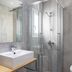 Central Cozy Apartments in Plaka by Upst bathroom in Athens with walk-in shower and square sink