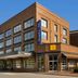 Hampton Inn Huntsville/Village of Providence exterior in Huntsville, brick hotel with entrance canopy