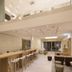The Passage - Urban & Lifestyle Hotel Basel lobby lounge with bar, stools, and mezzanine seating