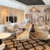 Hôtel Atalante - Relais Thalasso & Spa lounge in Sainte-Marie-de-Ré with wicker chairs and mural wall