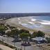 Rayentray Grand Hotel in Puerto Madryn overlooking a wide sandy beach and calm bay