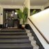 Urban Boutique Hotel Center Ljubljana staircase entrance with modern steps and potted plant