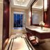 New Century Hotel Guian Guizhou bathroom with marble vanity and city view soaking tub in Anshun