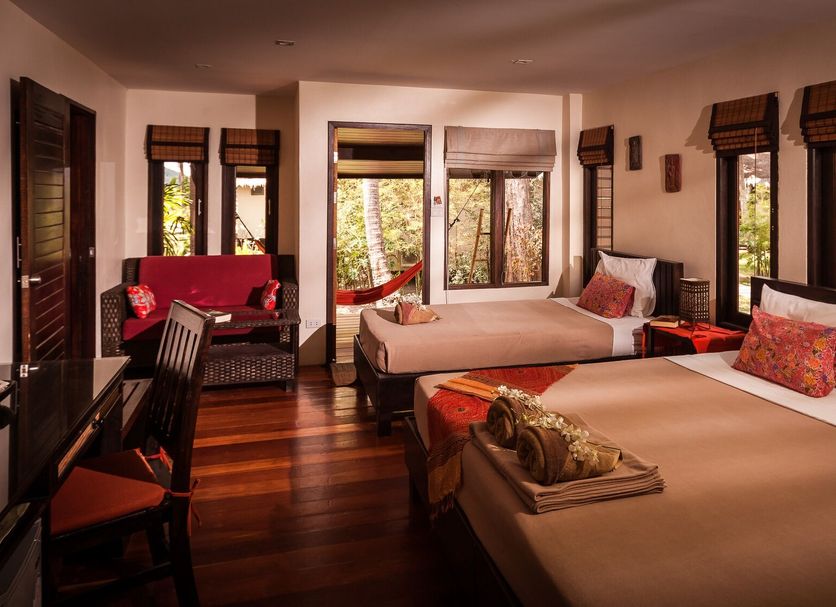 Baan Manali Resort in Ko Pha Ngan guest room with two beds and tropical-window views