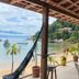Pousada Frezza Mergulho in Angra dos Reis with covered seaside terrace and hammock overlooking the bay