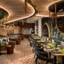Secrets Baby Beach Aruba Adults Only restaurant interior in Sint Nicolaas with curved ceiling and tables