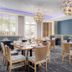 Capitol Plaza Hotel Montpelier, Tapestry Collection by Hilton dining room with set tables and blue banquettes