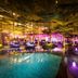 DoubleTree by Hilton Hotel Jakarta - Diponegoro lit poolside lounge at night in Jakarta