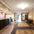 Hampton Inn By Hilton Elliot Lake lobby with front desk, seating area, and hallway to entrance