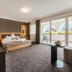 Klein Fein Hotel Anderlahn in Parcines with bedroom, seating area and balcony overlooking mountains