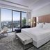 SLS Dubai Hotel & Residences room with city skyline view and floor-to-ceiling windows in Dubai