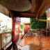 Hotel Santa Maria in Praia outdoor terrace with tables, chairs, canopy shade and stairway