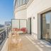 Yuna Porte-Maillot aparthotel in Paris with private balcony, city view and outdoor seating