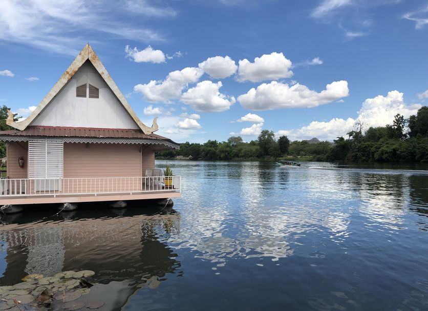 Bamboo House Kanchanaburi riverside bungalow overlooking the river and blue sky