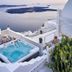 Santorini Mansion at Imerovigli terrace hot tub overlooking the caldera and sea in Imerovigli
