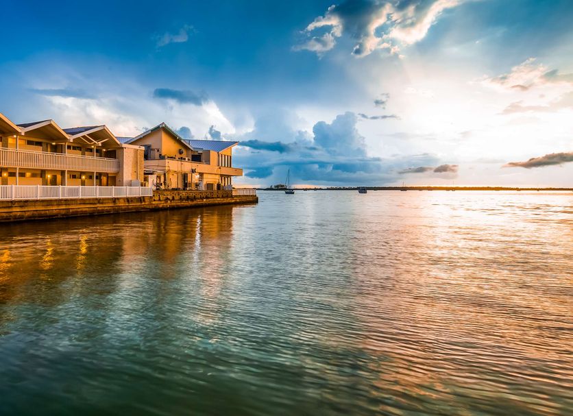 Best Western Plus Yacht Harbor Inn in Dunedin overlooking the waterfront at sunset