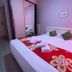 Hotel & Restaurant San Marco Ab in Toscolano Maderno, guest room with double bed and floral blanket