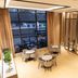 International Haiyuan Resort Hotel, Nantong: bright lounge with round tables and floor-to-ceiling city views