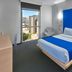 City Express Plus by Marriott Ciudad de México Reforma El Ángel room with city view and blue accent wall