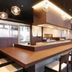 Jr-East Hotel Mets Nagaoka lobby lounge with long wooden counter and pendant lighting in Nagaoka