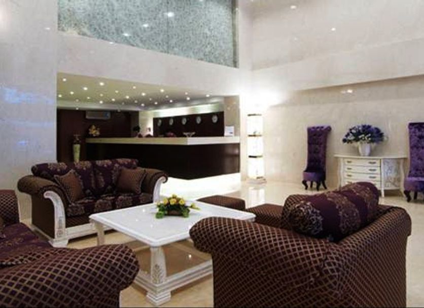 Lavender Central Hotel lobby lounge in Ho Chi Minh City with seating area and reception desk