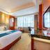 Yiwu Hotel (International Trade City) room in Jinhua with king bed, window seating and marble desk