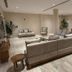 Umm Al Quwain Beach Hotel lobby lounge in Umm Al Qaiwain with sofas, chairs and tables