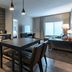 Residence Inn by Marriott Wilkes-Barre Arena suite with kitchenette, dining table and seating area