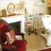 Landhotel Christopherhof in Grafenwiesen spa treatment room with massage table and red velvet chair