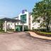 Motel 6-Joliet, IL - Chicago - I-55 exterior with entrance canopy and landscaped drive in Joliet