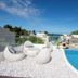 7Stones Boracay rooftop pool with lounge chairs and ocean view in Boracay