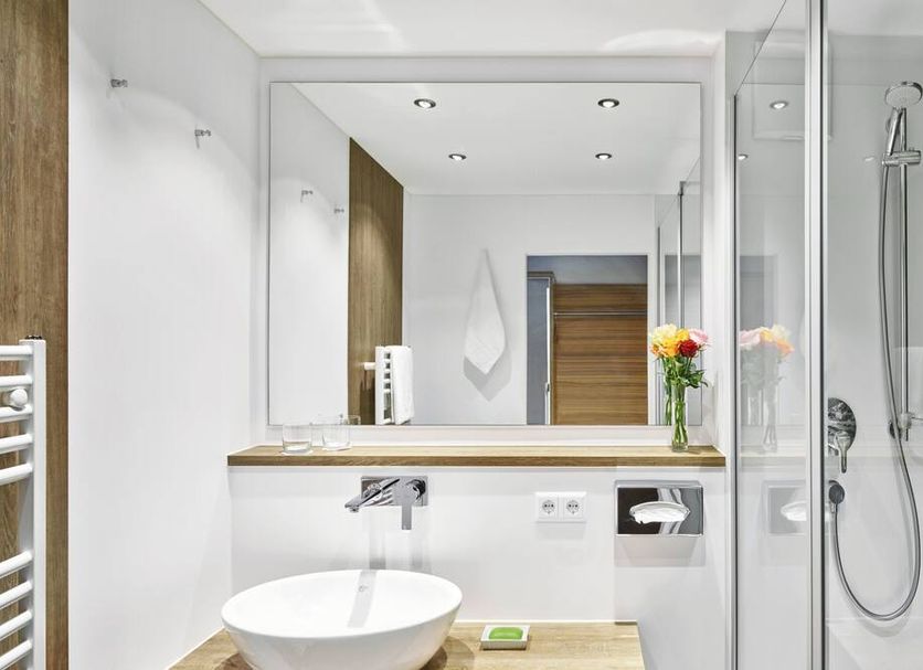Hotel Lamm Ostfildern modern bathroom with vessel sink, walk-in shower and large mirror