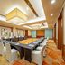 Holiday Inn Shanghai Pudong Kangqiao meeting room with U-shaped conference tables and white chairs