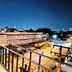 The Yak Cozy Chiang Mai balcony view over Chiang Mai city lights at night
