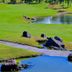 The Suites At Mount Malarayat in Lipa City: golf course with ponds, rocks, and manicured green fairways