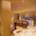 7Stones Boracay bar lounge with marble counter, woven stools and kitchenette in Boracay