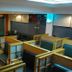 Hotel Sogo Quezon Avenue in Manila lobby with partitioned seating booths and tables