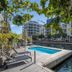 Lawhill Luxury Apartments in Cape Town with a pool deck beside the canal and modern apartments