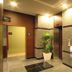 Hotel Route-Inn Utsunomiya Miyukicho -Kokudou4gou- lobby with elevators and potted plant